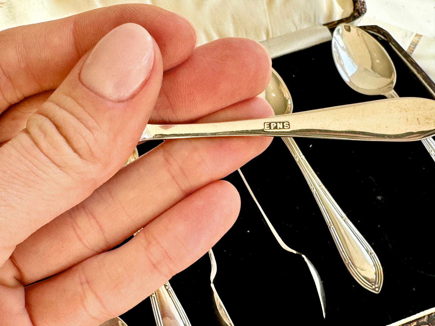 Antique EPNS Silver Plated Teaspoon Set in Ornate Faux-Croc Box – 7 Pieces with Sugar Tongs