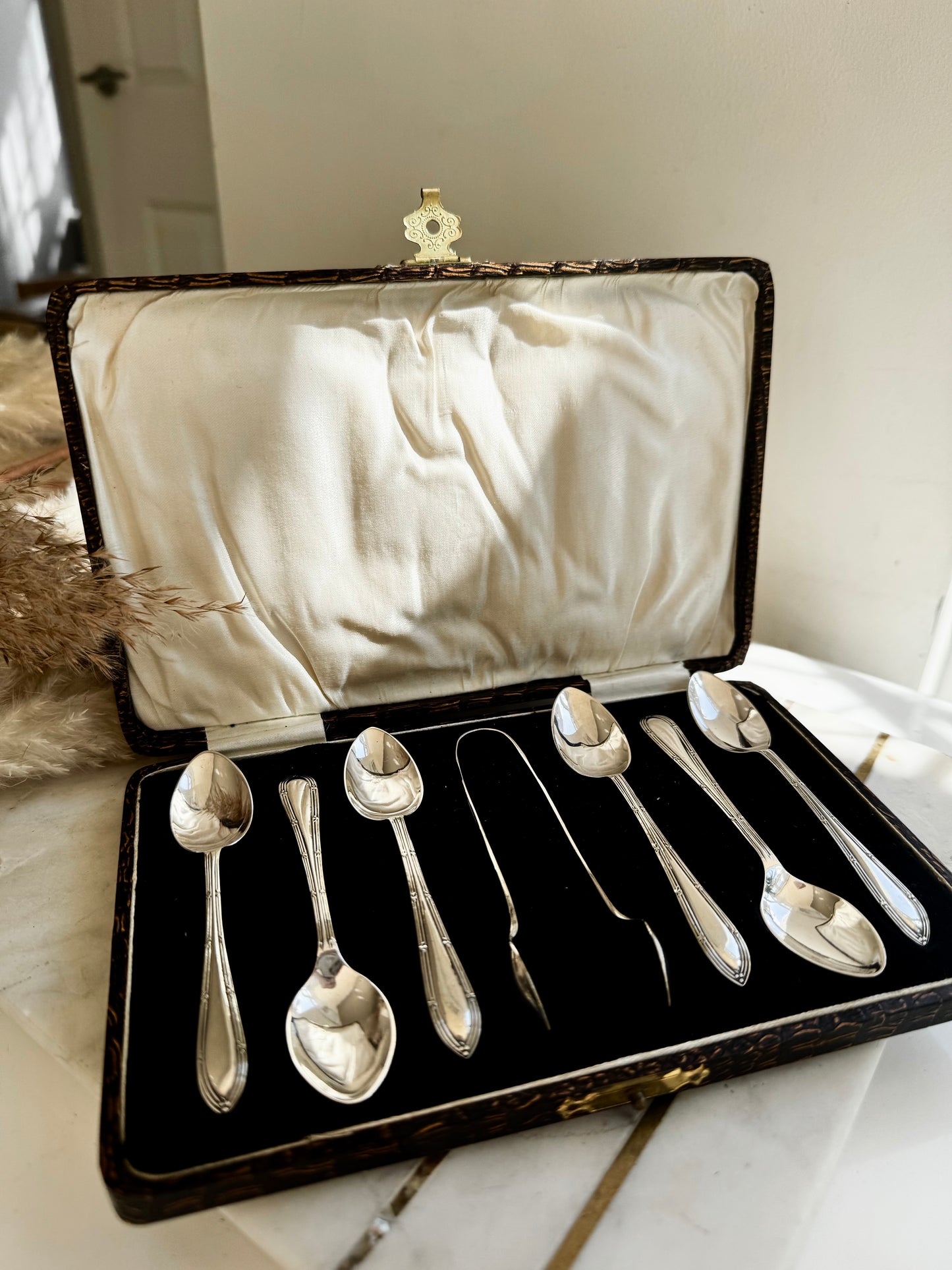 Antique EPNS Silver Plated Teaspoon Set in Ornate Faux-Croc Box – 7 Pieces with Sugar Tongs