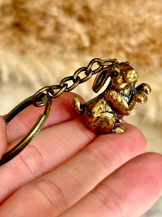 Solid brass adorable bunny pendant, metal rabbit figurine, happy hare charm, bunny gentlemen ornament