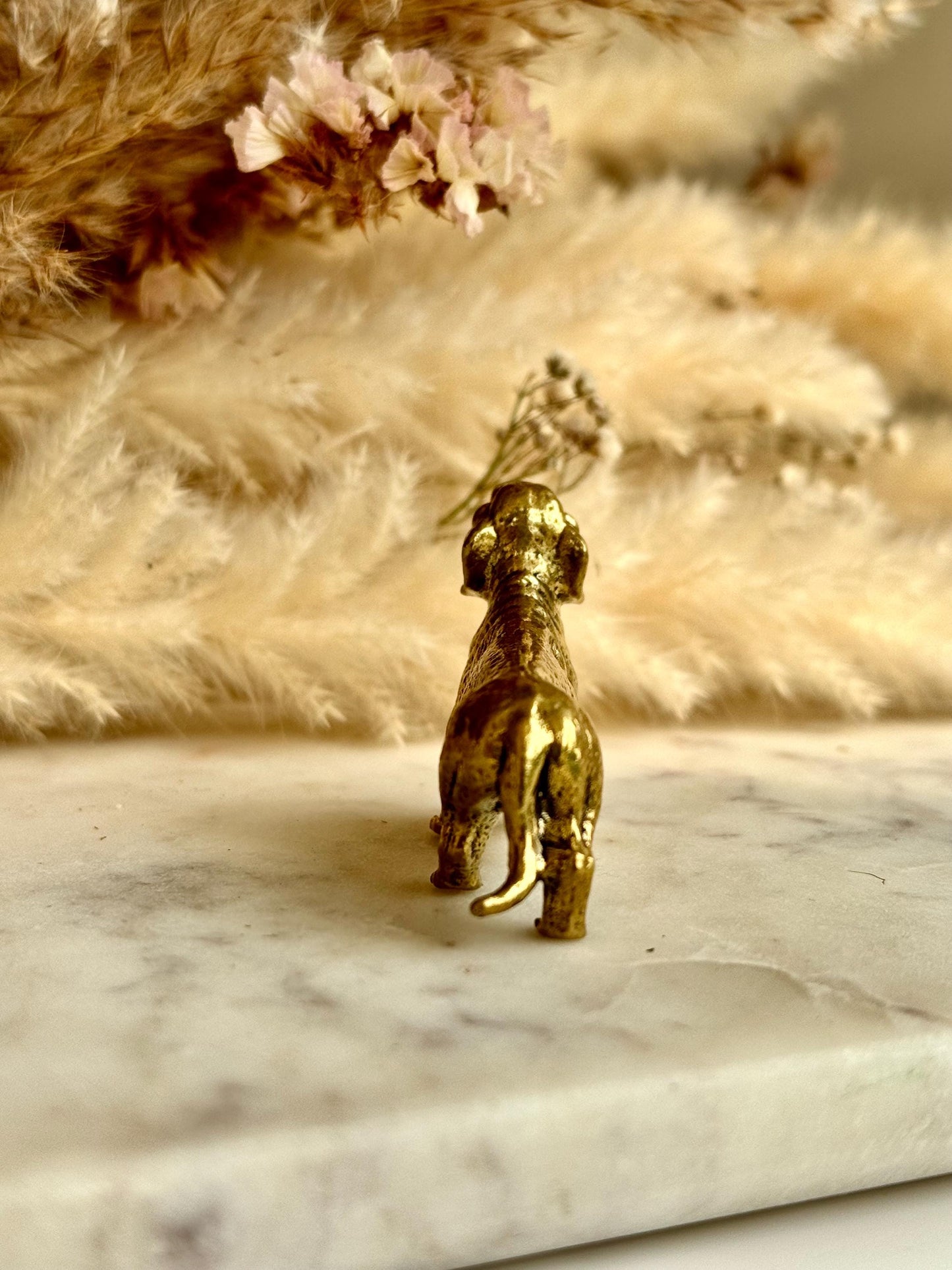 Lifelike solid brass dachshund figurine, beautiful German badger-dog statuette, metal sausage dog ornament, beautiful dog paperweight