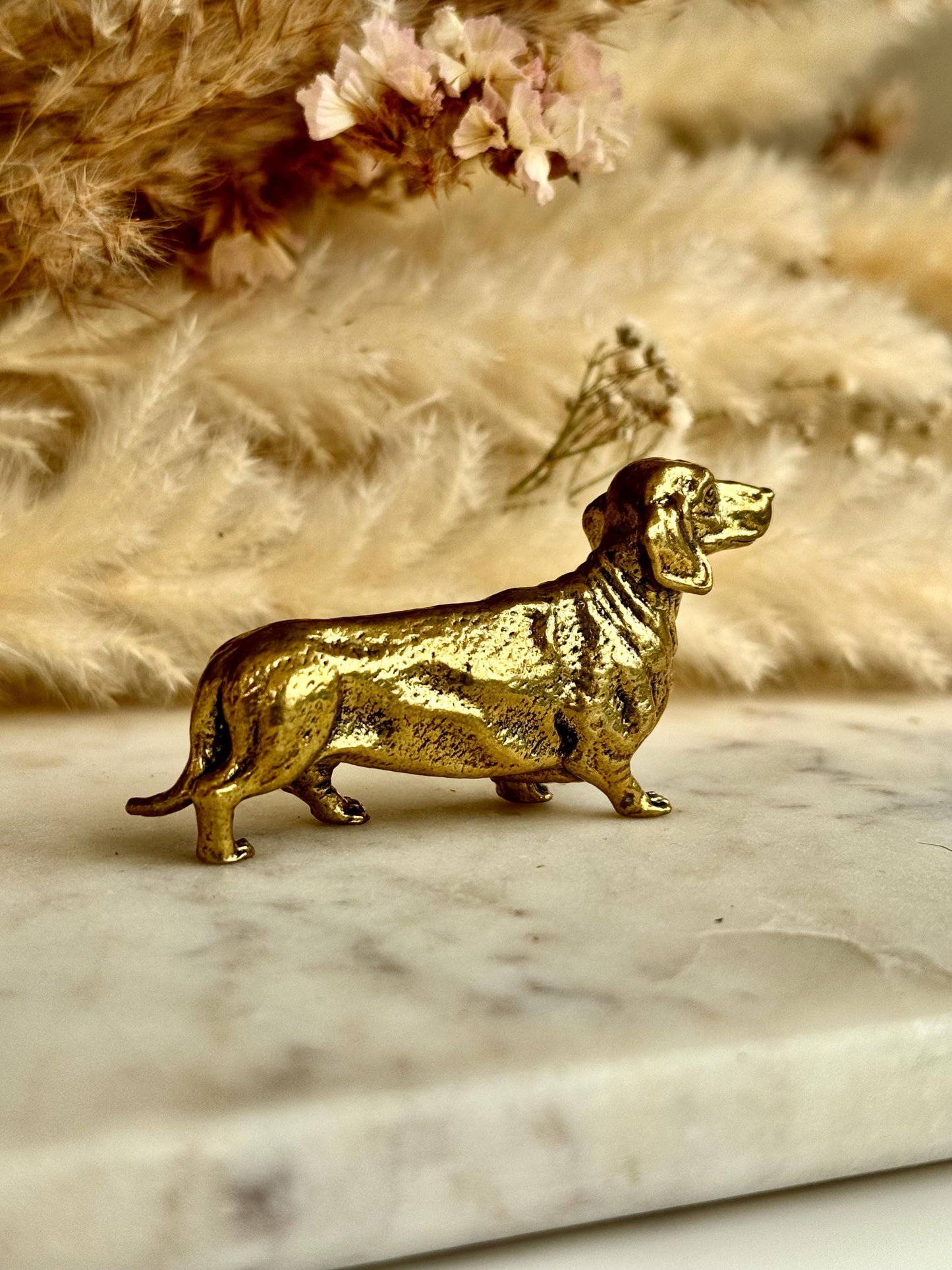 Lifelike solid brass dachshund figurine, beautiful German badger-dog statuette, metal sausage dog ornament, beautiful dog paperweight