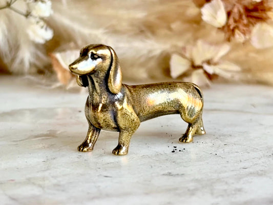 Lifelike solid brass dachshund figurine, beautiful German badger-dog statuette, metal sausage dog ornament, beautiful dog paperweight