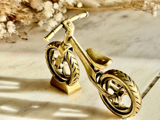Solid brass balance bike figurine, rolling wheels model, miniature bicycle sculpture, unique metal cycling decor, collectible biker