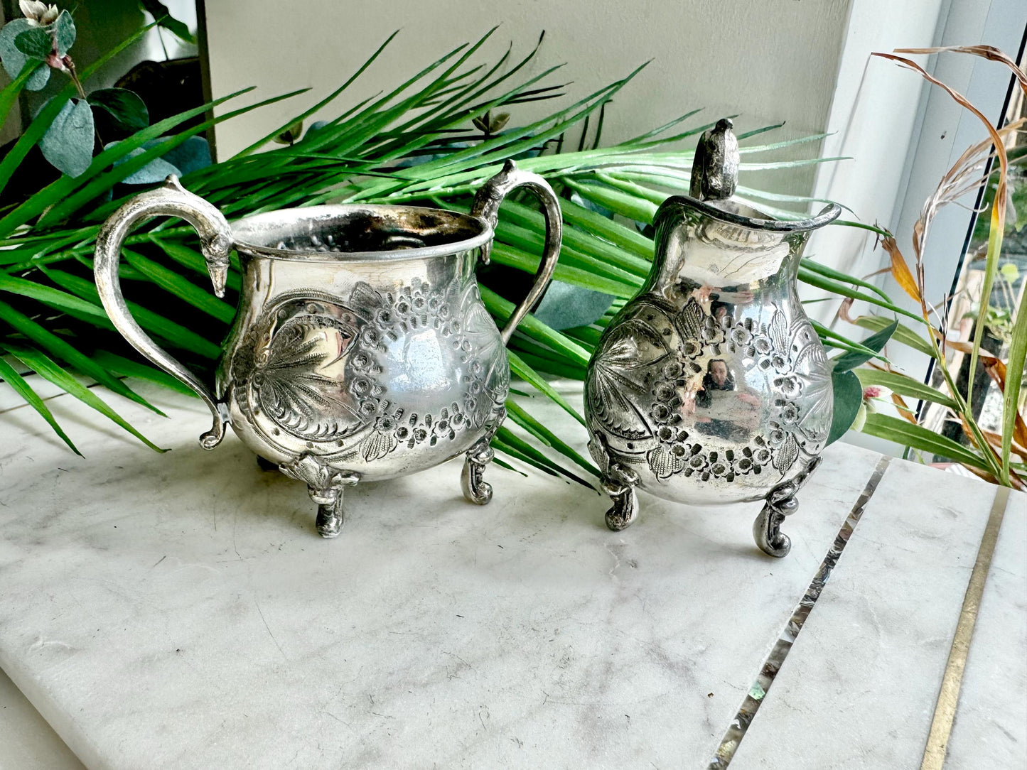Antique Victorian Silver-Plated Milk Jug and Sugar Bowl – Ornate Repoussé Floral Design, Footed, British Silverware (c. 19th Century)