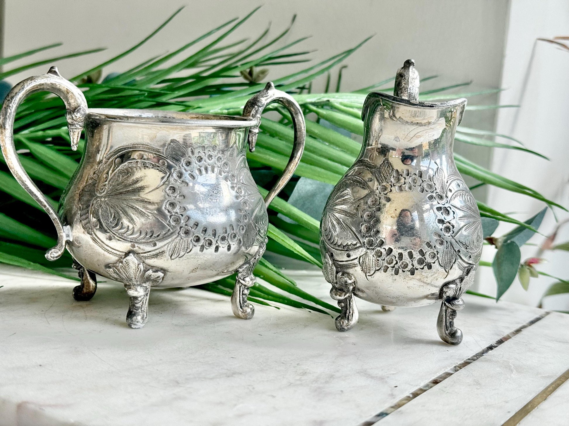 Antique Victorian Silver-Plated Milk Jug and Sugar Bowl – Ornate Repoussé Floral Design, Footed, British Silverware (c. 19th Century)