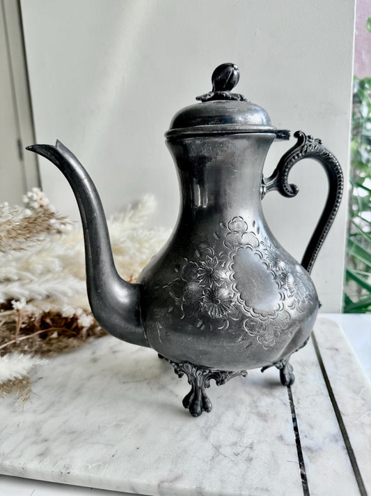 Antique Silver-Plated Rococo-Style Coffee Pot with Ornate Floral Engraving and Footed Base