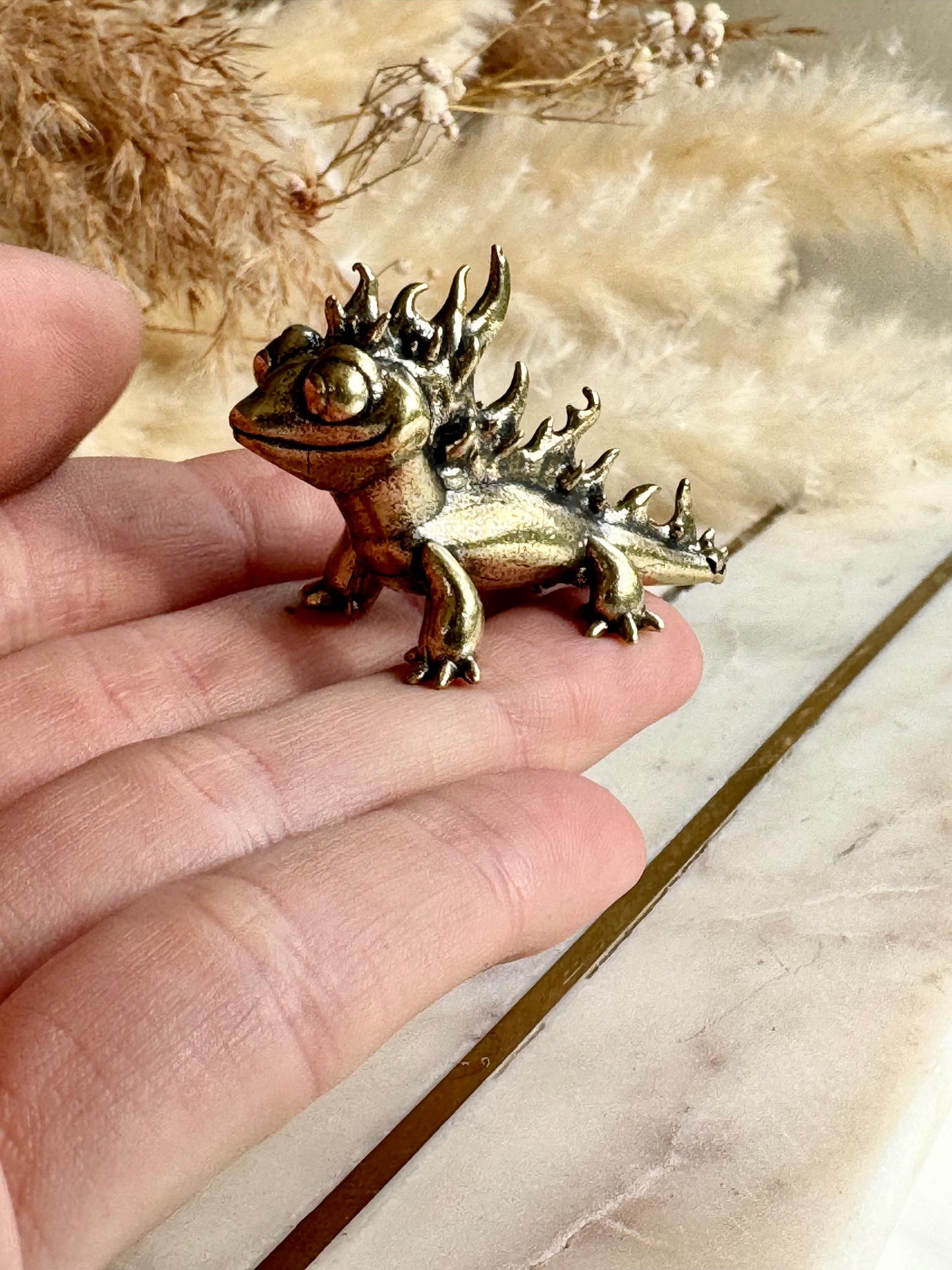 Lifelike solid brass fantasy lizard figurine, happy dragon-like reptile statuette, metal mythical creature ornament, chameleon figurine