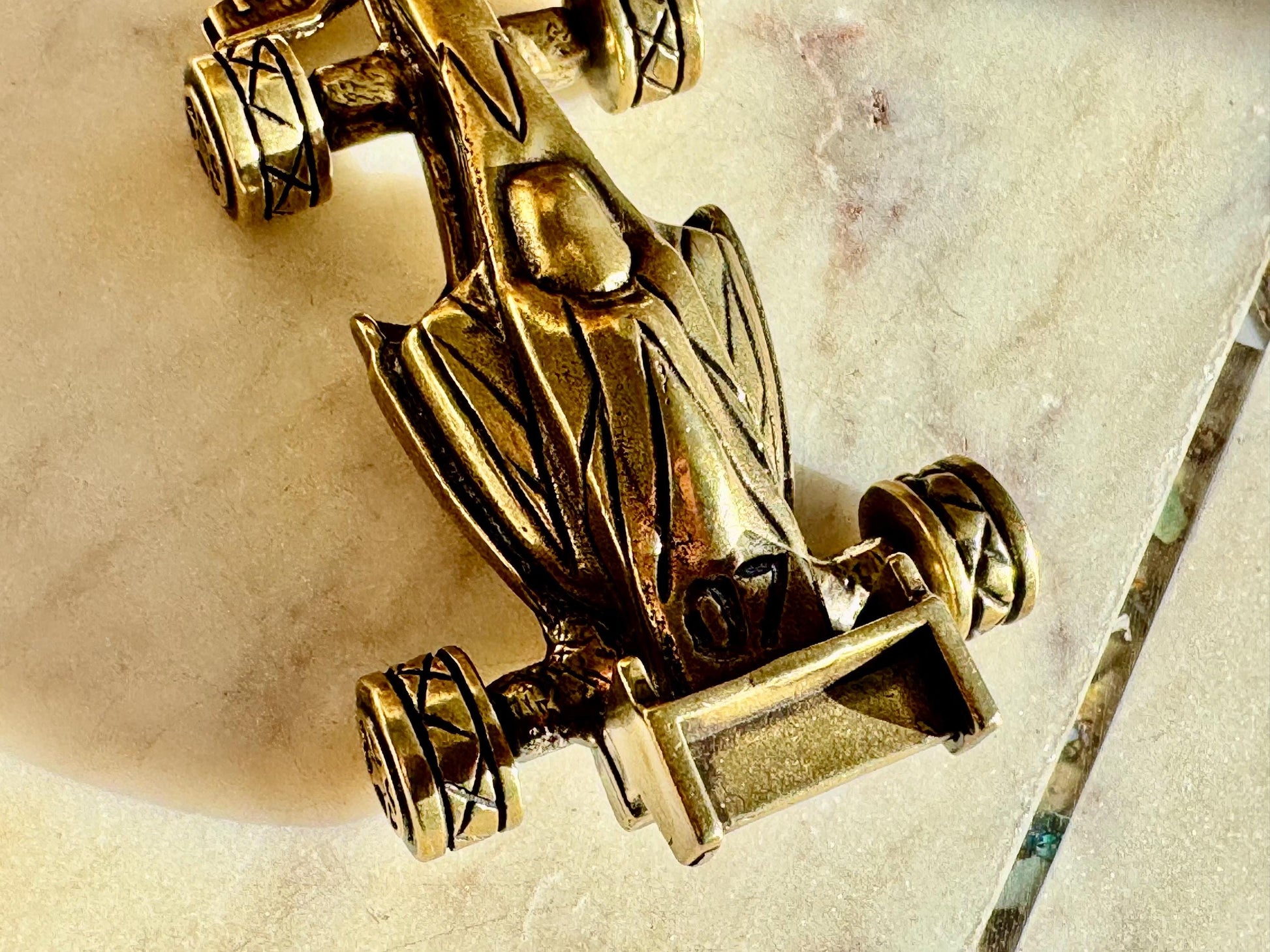 Solid brass Formula 1 race car, F1 collectible, rolling wheels metal statue, detailed brass racing car, unique motorsport decor