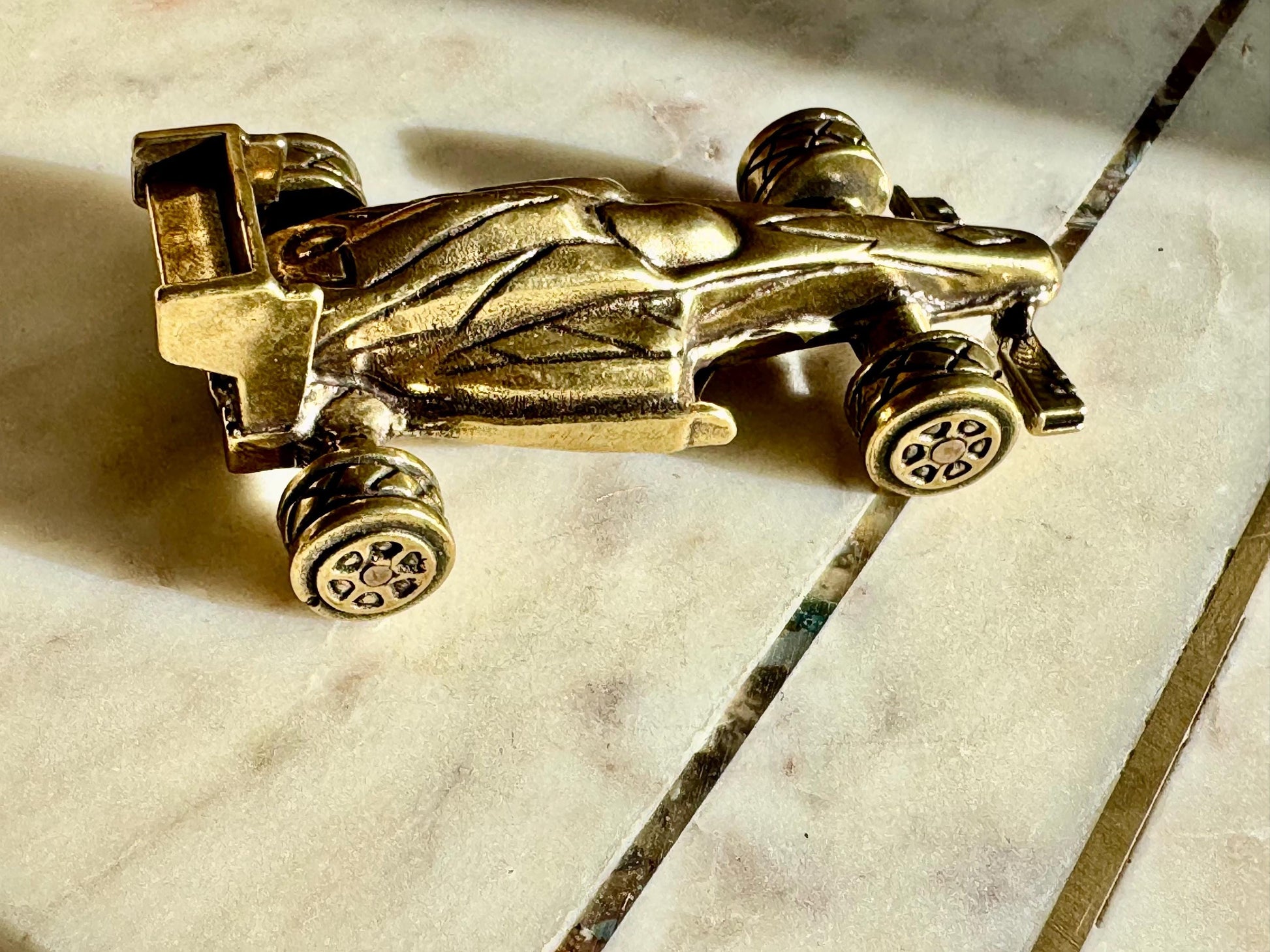 Solid brass Formula 1 race car, F1 collectible, rolling wheels metal statue, detailed brass racing car, unique motorsport decor