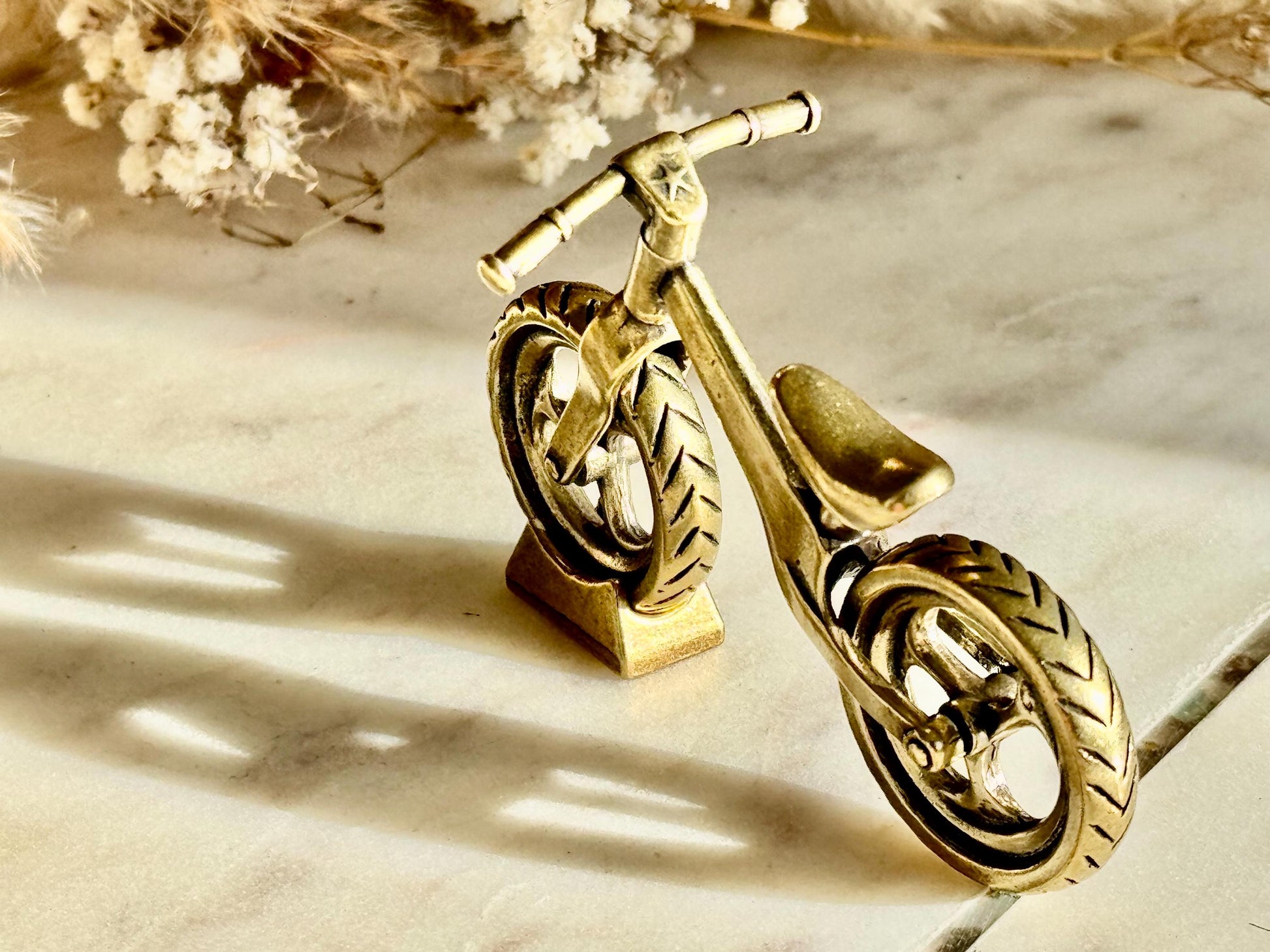 Solid brass balance bike figurine, rolling wheels model, miniature bicycle sculpture, unique metal cycling decor, collectible biker