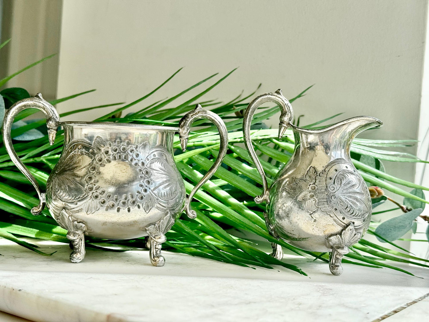 Antique Victorian Silver-Plated Milk Jug and Sugar Bowl – Ornate Repoussé Floral Design, Footed, British Silverware (c. 19th Century)