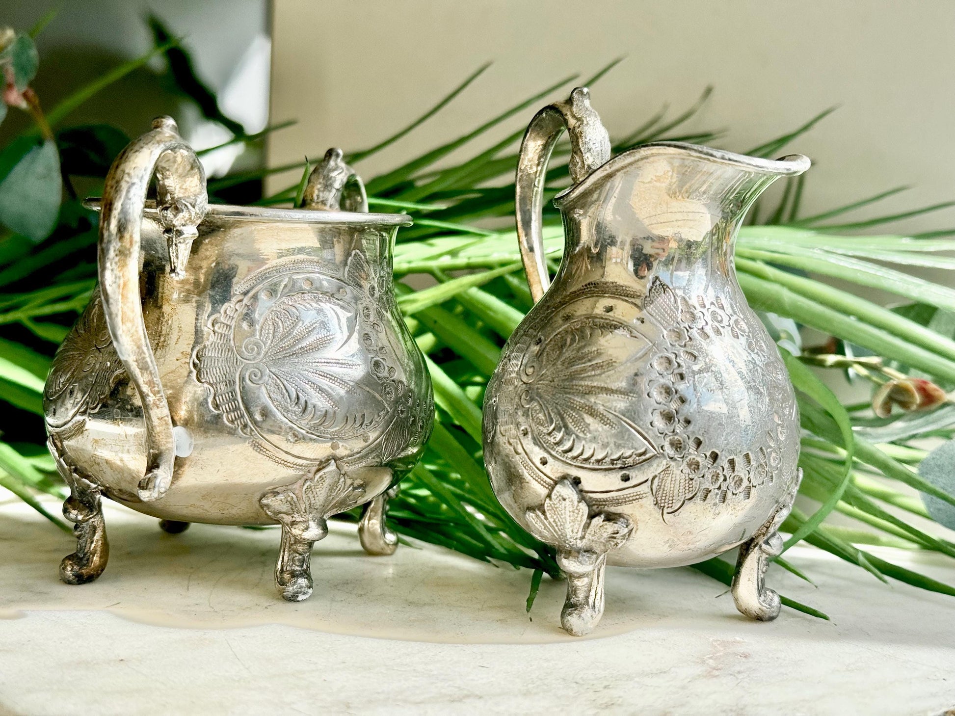 Antique Victorian Silver-Plated Milk Jug and Sugar Bowl – Ornate Repoussé Floral Design, Footed, British Silverware (c. 19th Century)