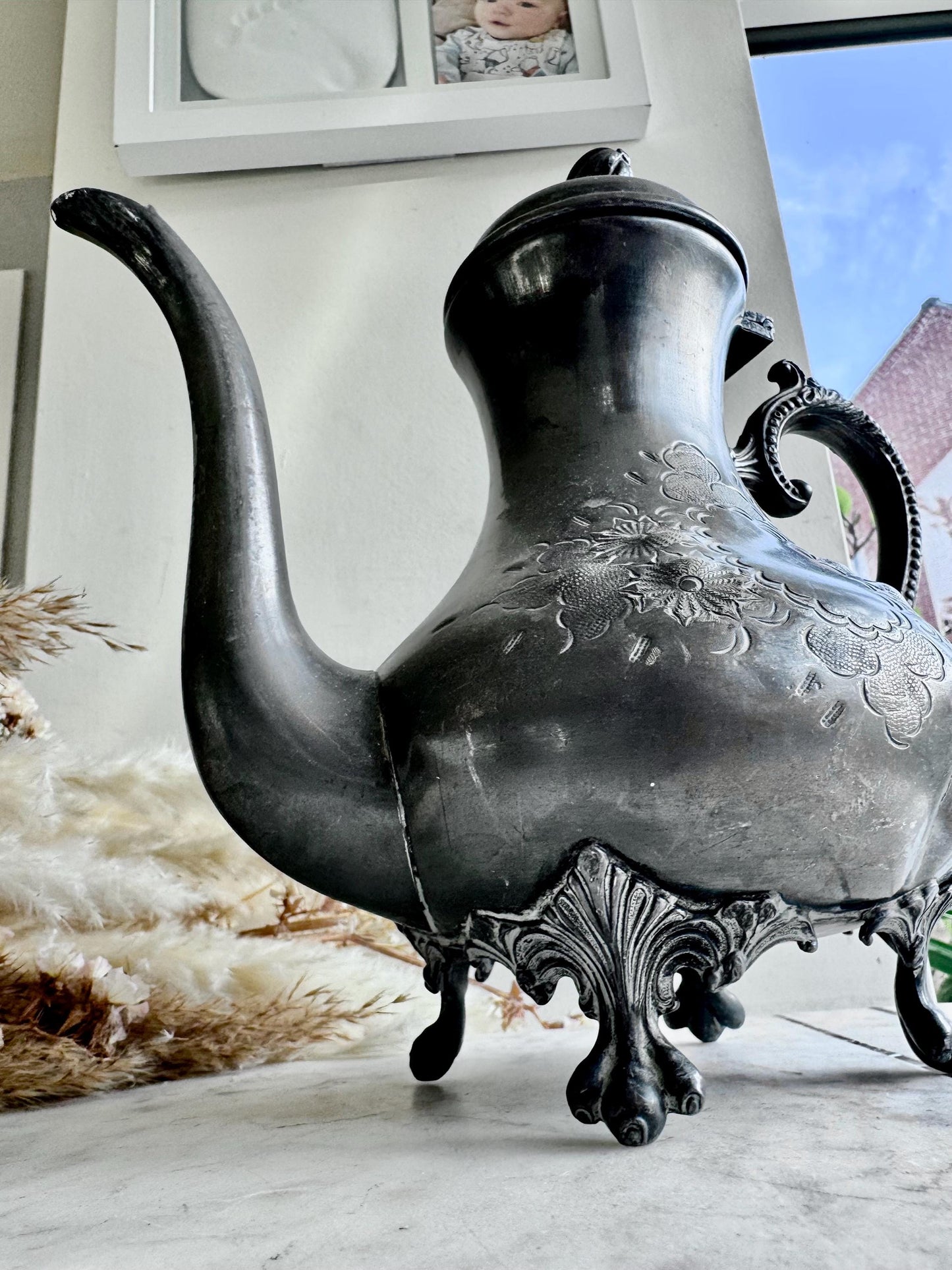 Antique Silver-Plated Rococo-Style Coffee Pot with Ornate Floral Engraving and Footed Base