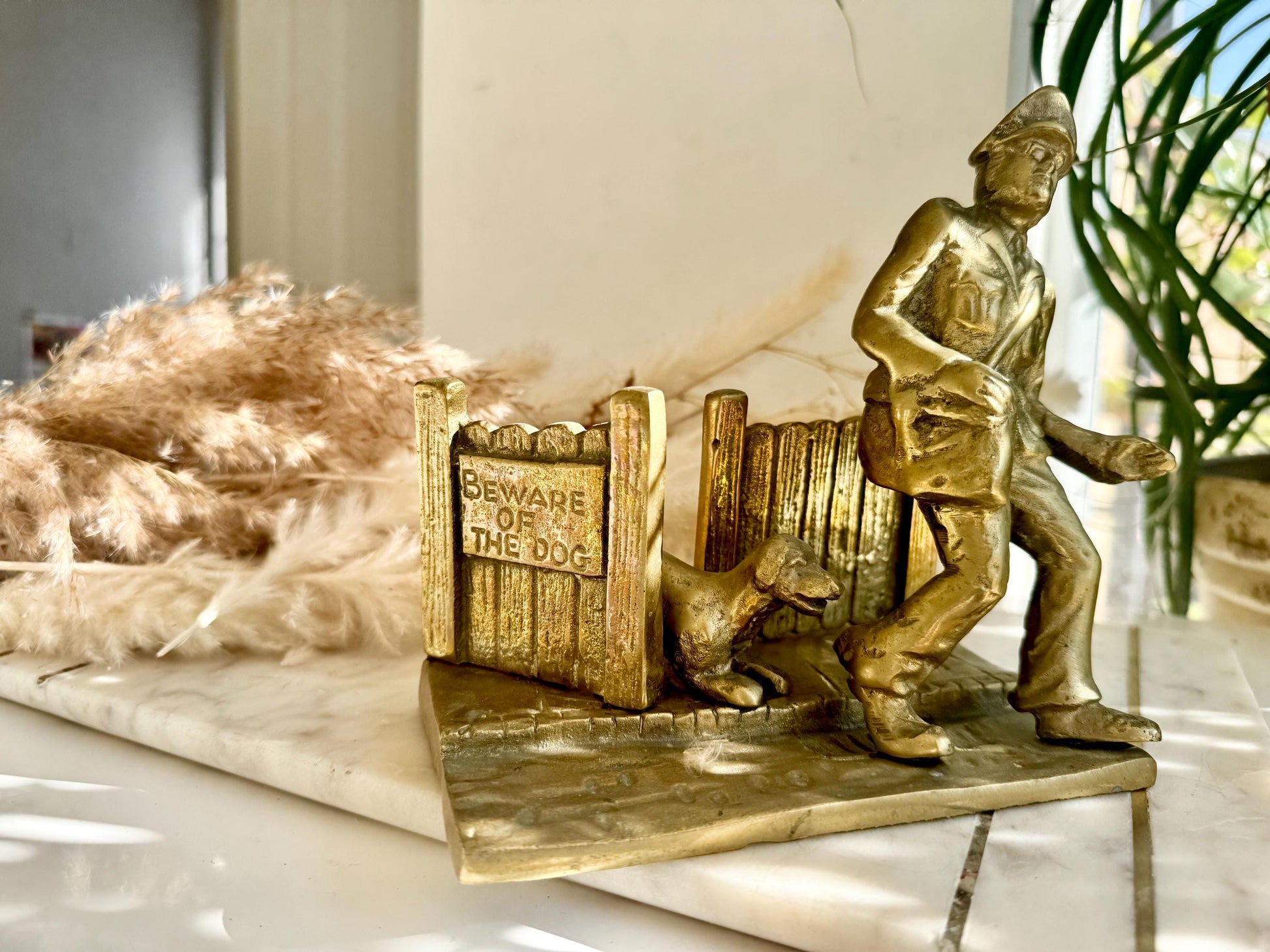 Vintage Brass Doorstop “Beware of the Dog” with Postman and Dog Scene – Humorous Figurine – Mid-Century Cast Brass Sculpture