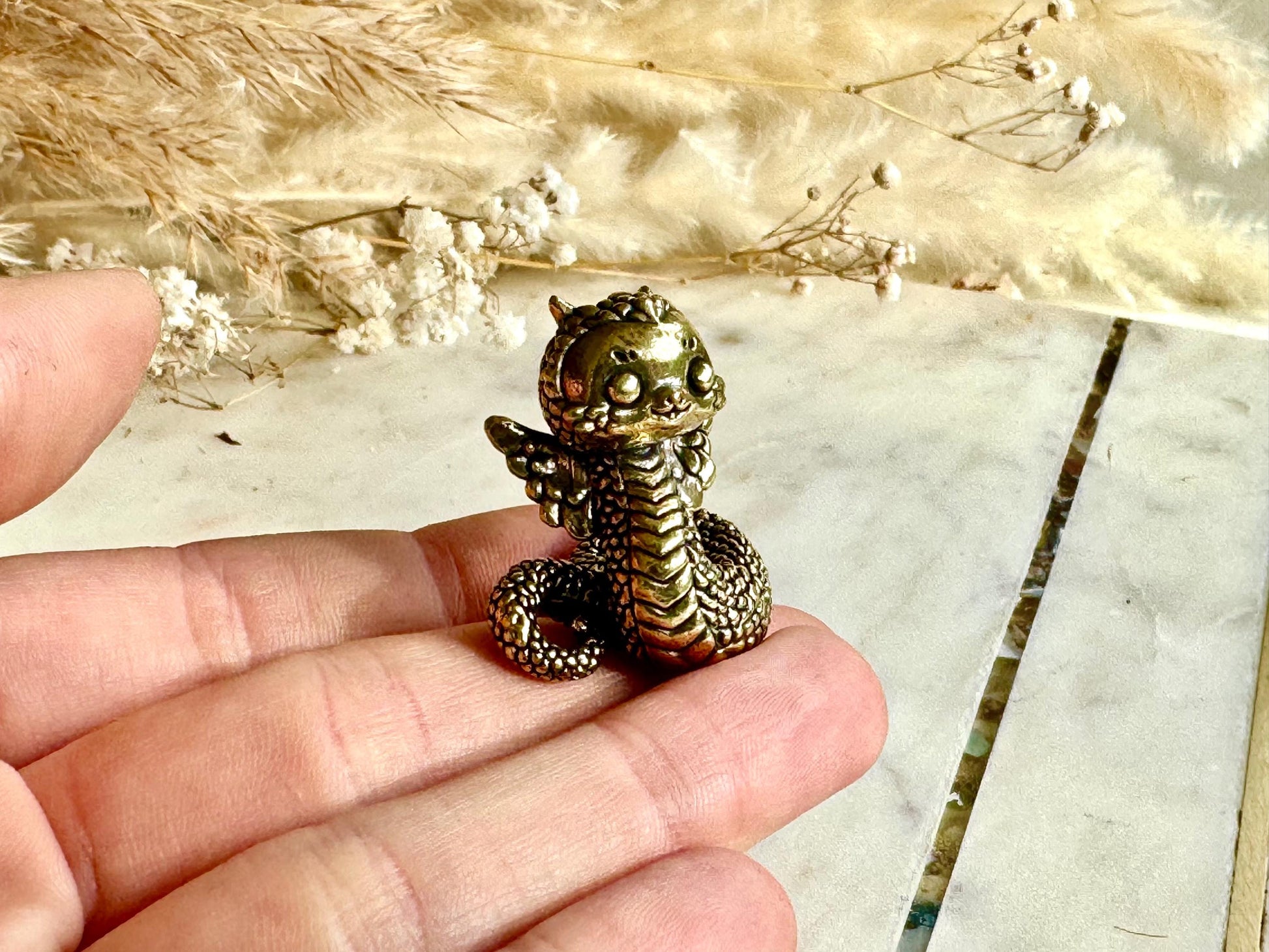 Miniature Brass Winged Dragon Snake Figurine – Whimsical Mythical Creature with Curled Tail and Scaled Detail