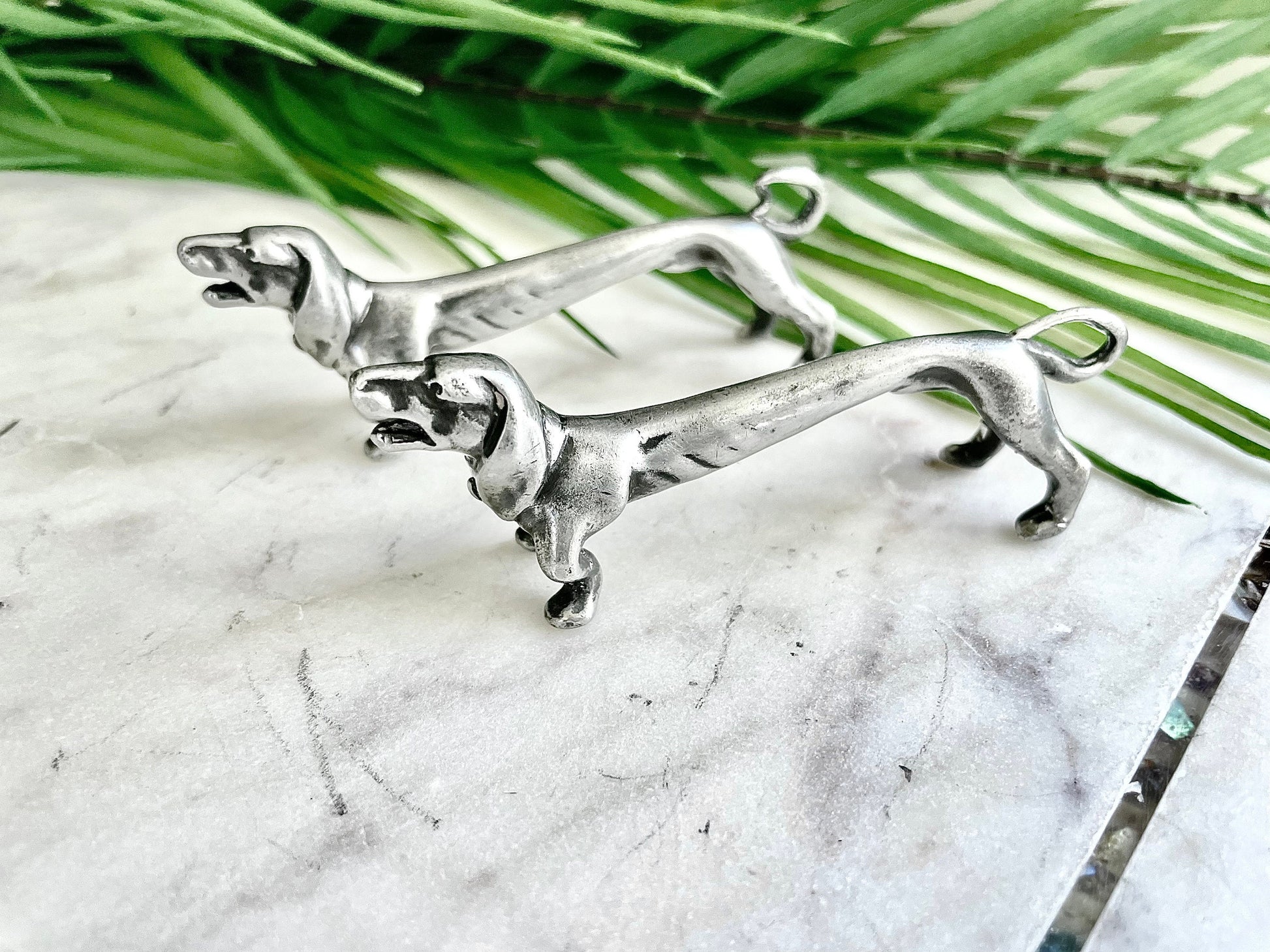 Vintage Pair Of Novelty Silver Plated modelled as barking Dachshund Dog Knife Rests, sausage Dog Cutlery rests