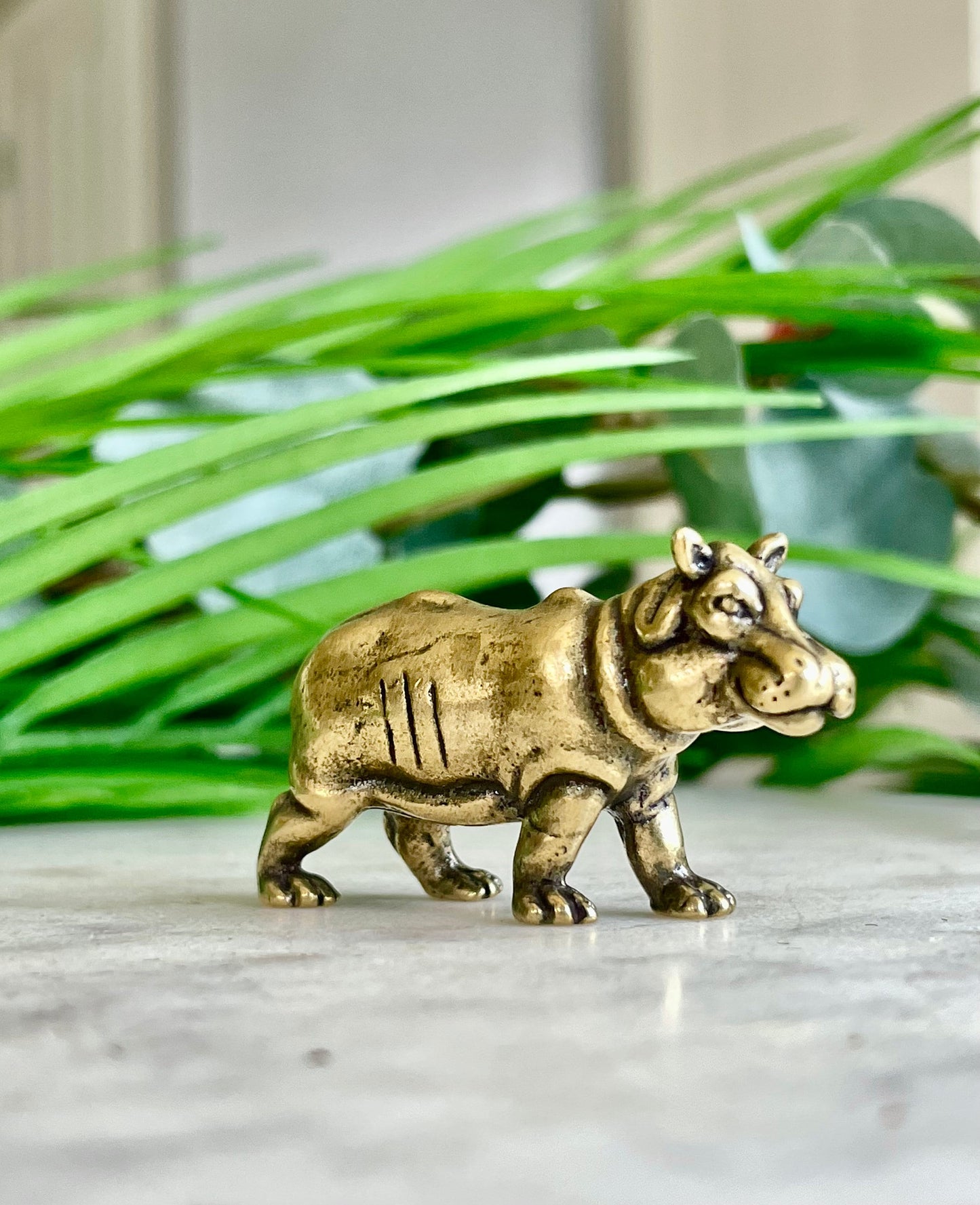 Solid brass hippo figurine, charming hippopotamus sculpture, safari wildlife, jungle-themed nursery decoration, whimsical adornment