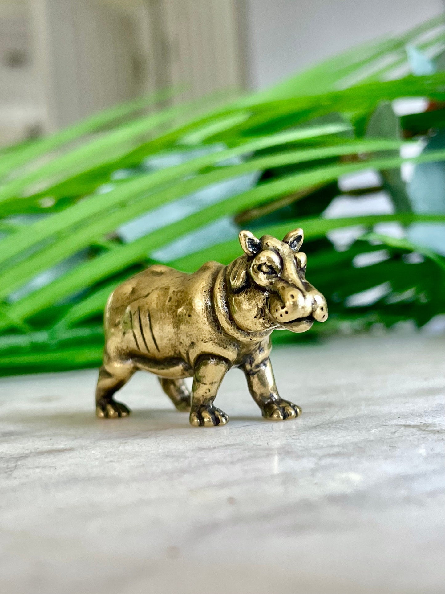 Solid brass hippo figurine, charming hippopotamus sculpture, safari wildlife, jungle-themed nursery decoration, whimsical adornment