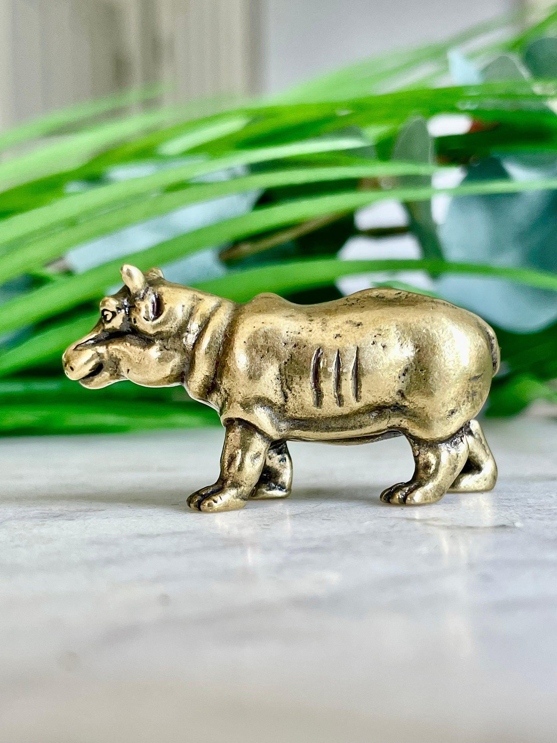 Solid brass hippo figurine, charming hippopotamus sculpture, safari wildlife, jungle-themed nursery decoration, whimsical adornment