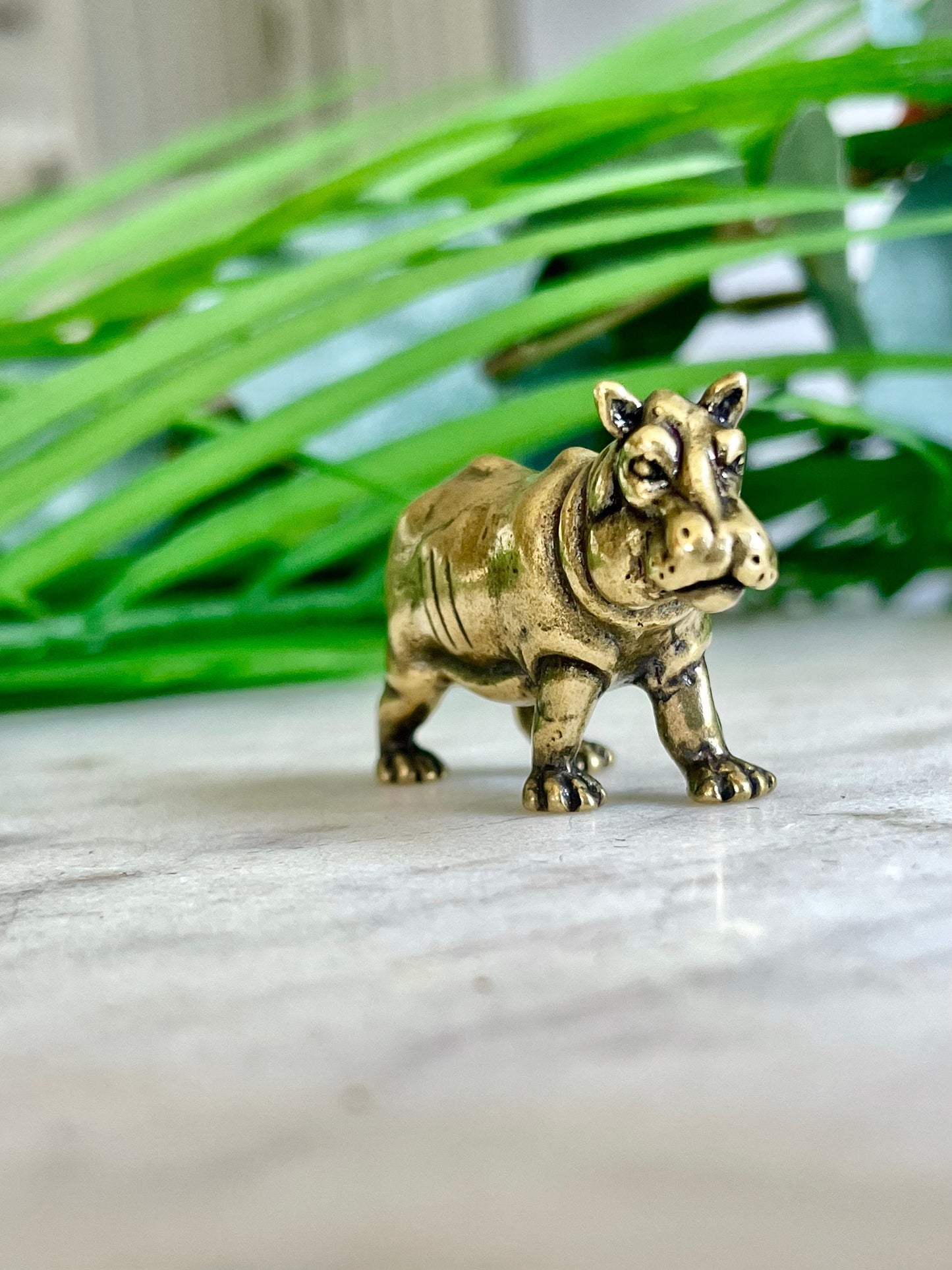 Solid brass hippo figurine, charming hippopotamus sculpture, safari wildlife, jungle-themed nursery decoration, whimsical adornment