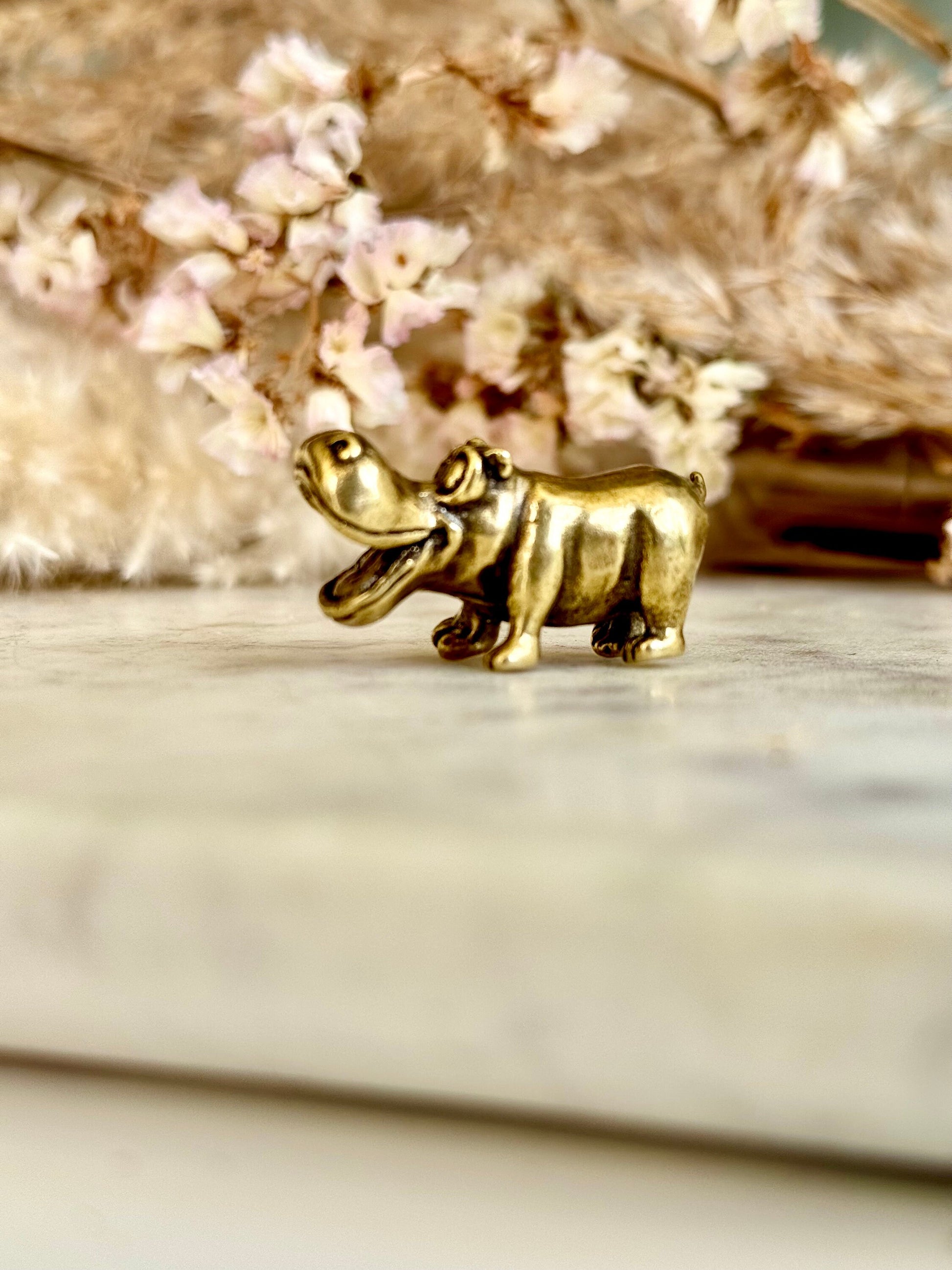 Solid brass Smilling hippo figurine, charming hippopotamus sculpture, safari wildlife, zoo-themed nursery decoration, whimsical adornment