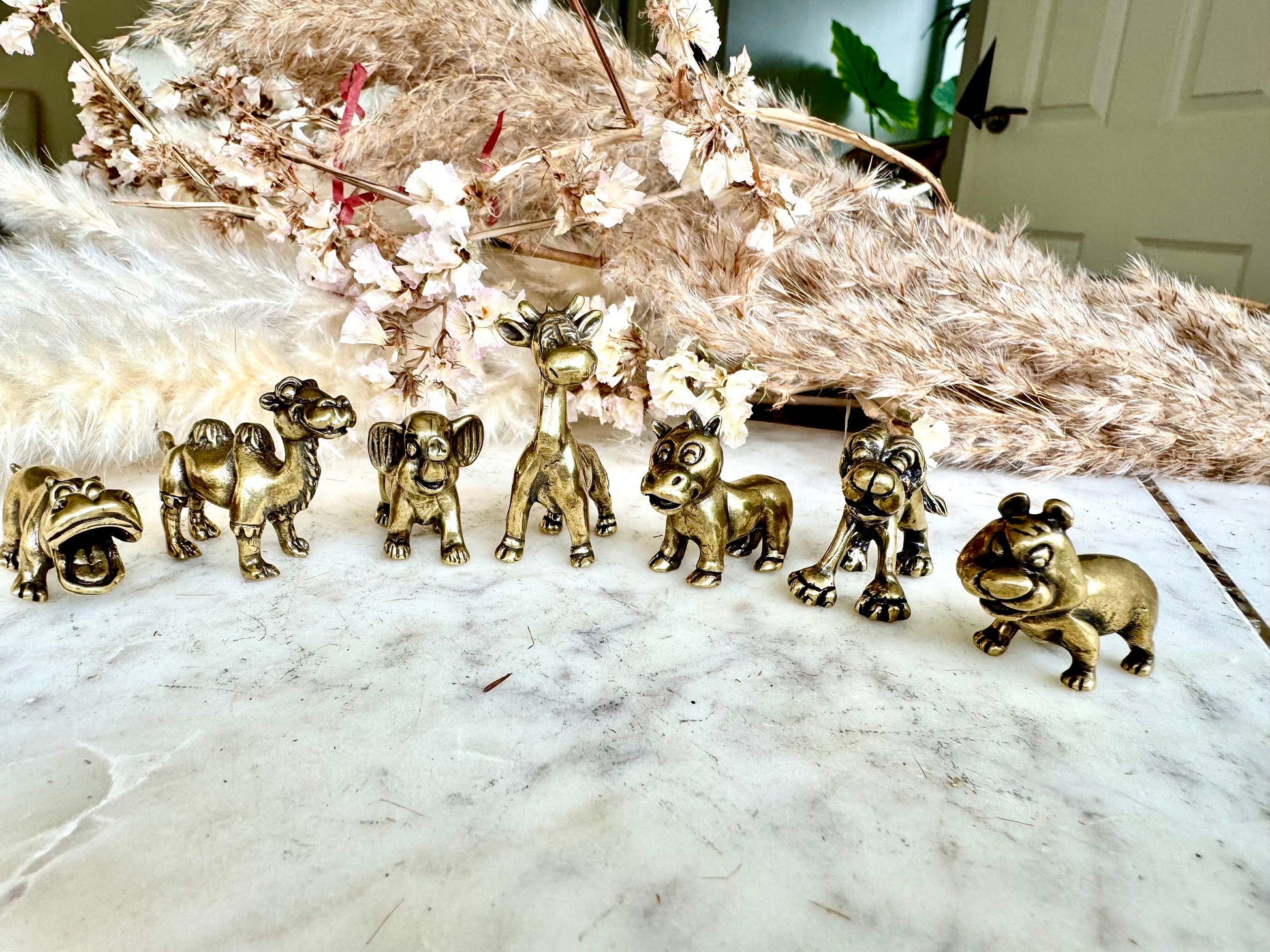 Solid brass Smilling hippo figurine, charming hippopotamus sculpture, safari wildlife, zoo-themed nursery decoration, whimsical adornment