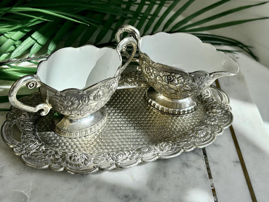 Vintage Silver Embossed Cream and Sugar Set with White Enamel Interior on Matching Tray – Elegant Silver Kitchen Decor for Serving