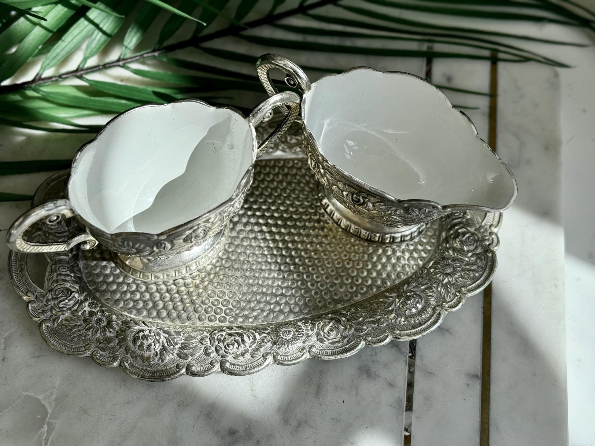 Vintage Silver Embossed Cream and Sugar Set with White Enamel Interior on Matching Tray – Elegant Silver Kitchen Decor for Serving