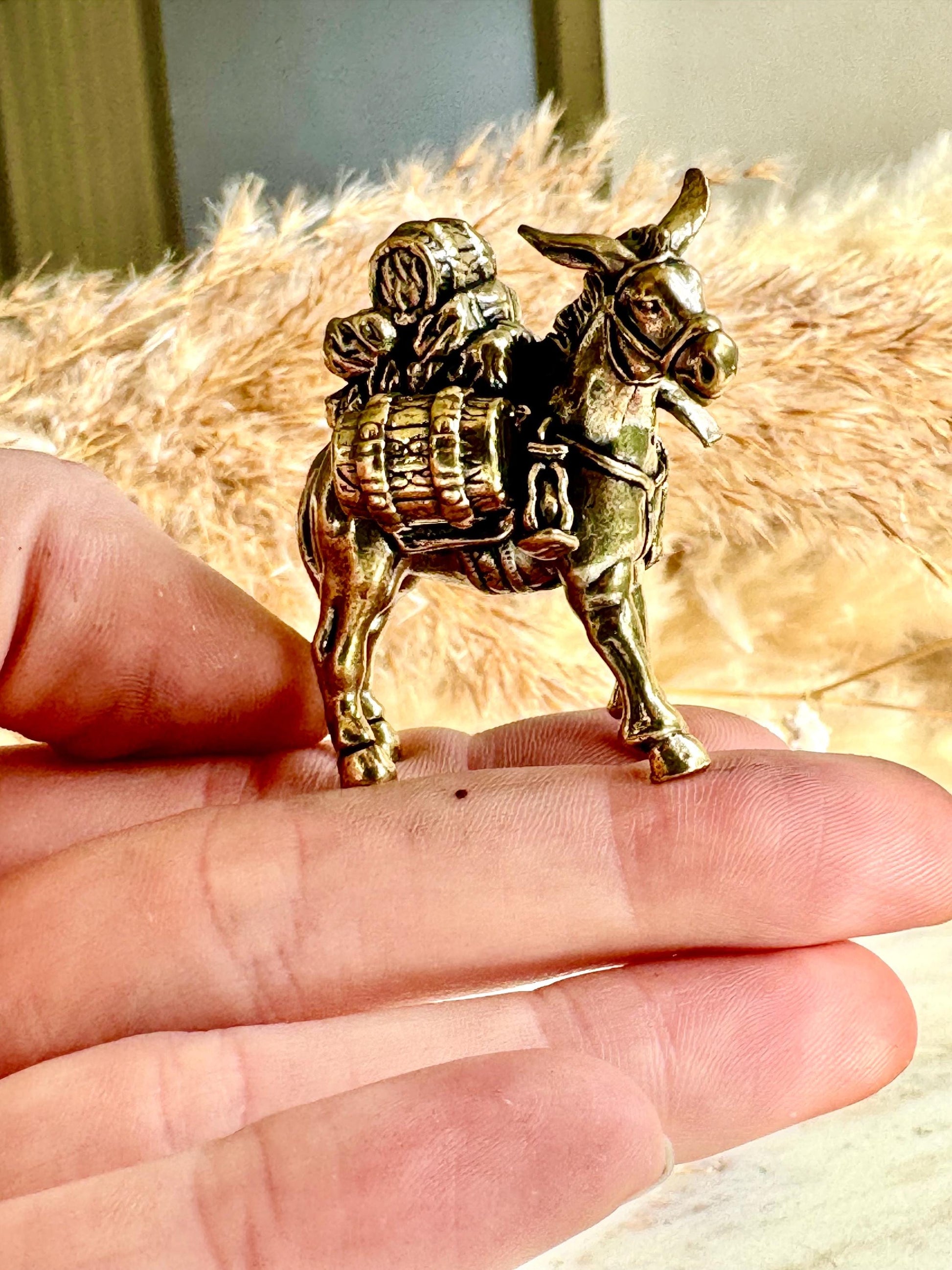 Solid brass traveler on donkey figurine, rustic caravan sculpture, nomad metal ornament, miniature desert journey souvenir