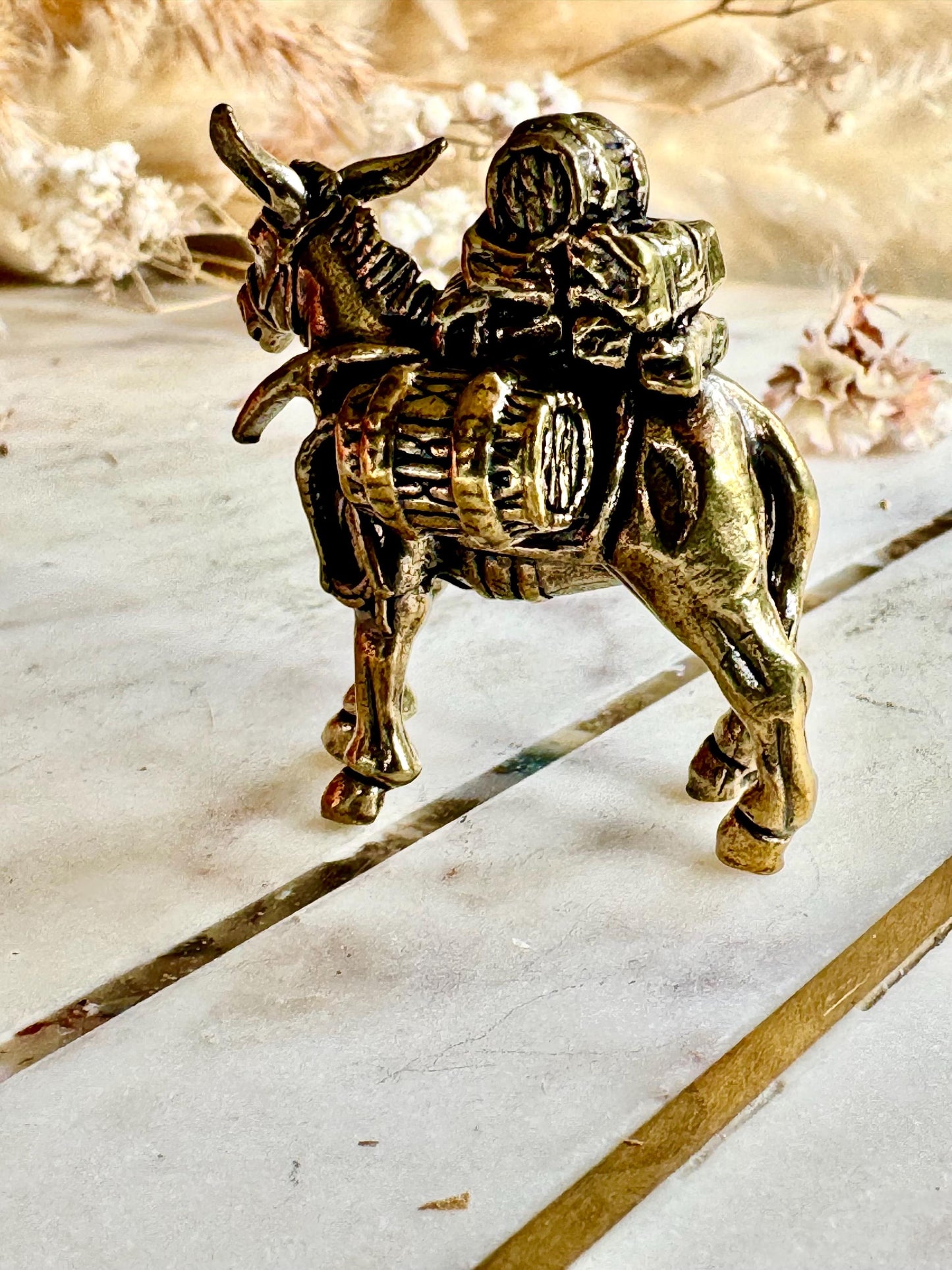 Solid brass traveler on donkey figurine, rustic caravan sculpture, nomad metal ornament, miniature desert journey souvenir
