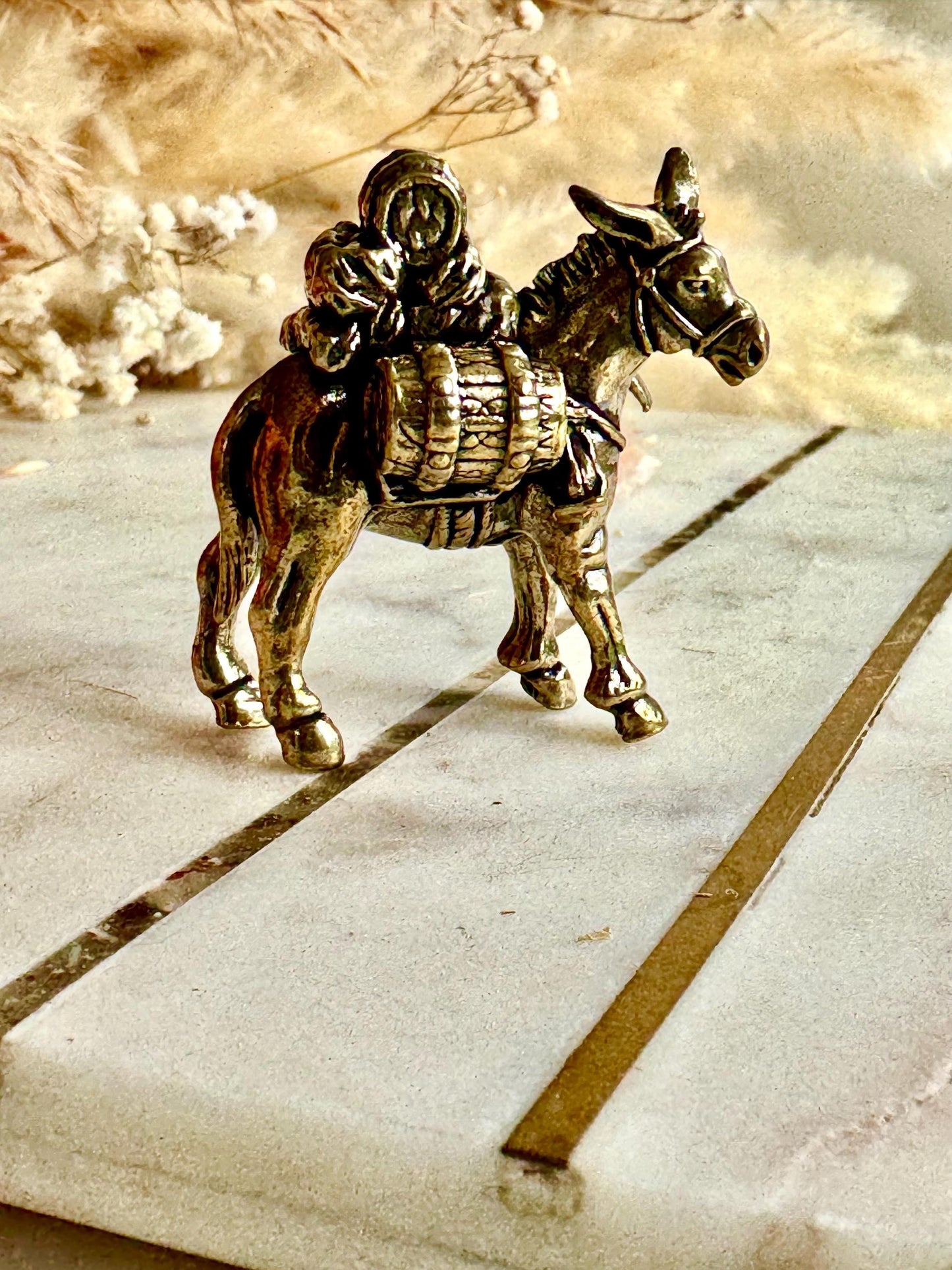 Solid brass traveler on donkey figurine, rustic caravan sculpture, nomad metal ornament, miniature desert journey souvenir